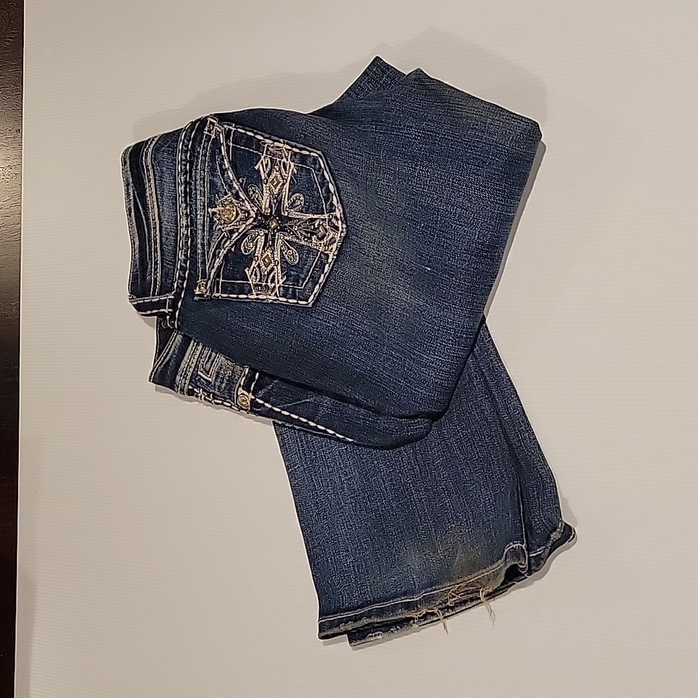 Miss me jeans.  Boot cut